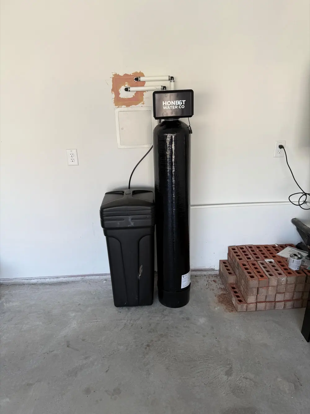 Whole-home softener with filter housings plumbed in above the control valve
